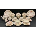 A Royal Crown Derby posies pattern ten setting tea service, inc tea pot, milk jug, sugar bowl, cups,