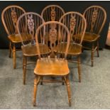 A set of six modern wheel back dining/side chairs, saddle seats, H-stretcher, turned legs,(6)
