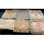 Needlework cushion covers, assorted floral designs, some sets (14)
