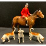A Beswick model Huntsman, brown gloss, three assorted hounds (4)