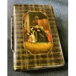 A 19th century hand painted tartan ware rectangular snuff box, painted with a seated elderly lady