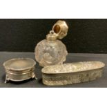 An Edwardian globular scent bottle, moulded and etched with scrolls and flower heads, domed silver