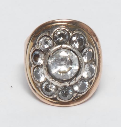 A 'George III' diamond and yellow gold coloured metal gentleman's ring, the flower shaped tablet