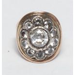 A 'George III' diamond and yellow gold coloured metal gentleman's ring, the flower shaped tablet