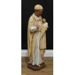 A late 19th century German painted figural carving, of St Joseph, the canted square base marked