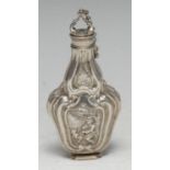 A French Rococo silver flattened vasular scent bottle, chased with a lady holding an exotic