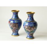 A Pair of Chinese, Republic Period Cloisonne Vases. The Bronze Hu form vases decorated with