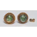 A pair of Victorian gold coloured metal and rock crystal stud earrings, intaglio reverse carved