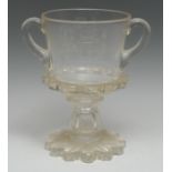 An early 20th century royal commemorative glass two-handled pedestal vase, etched with a crown and