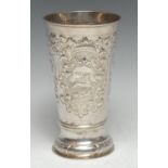 An 18th century Russian silver waisted cylindrical beaker, repousse chased with putti hunti deer,