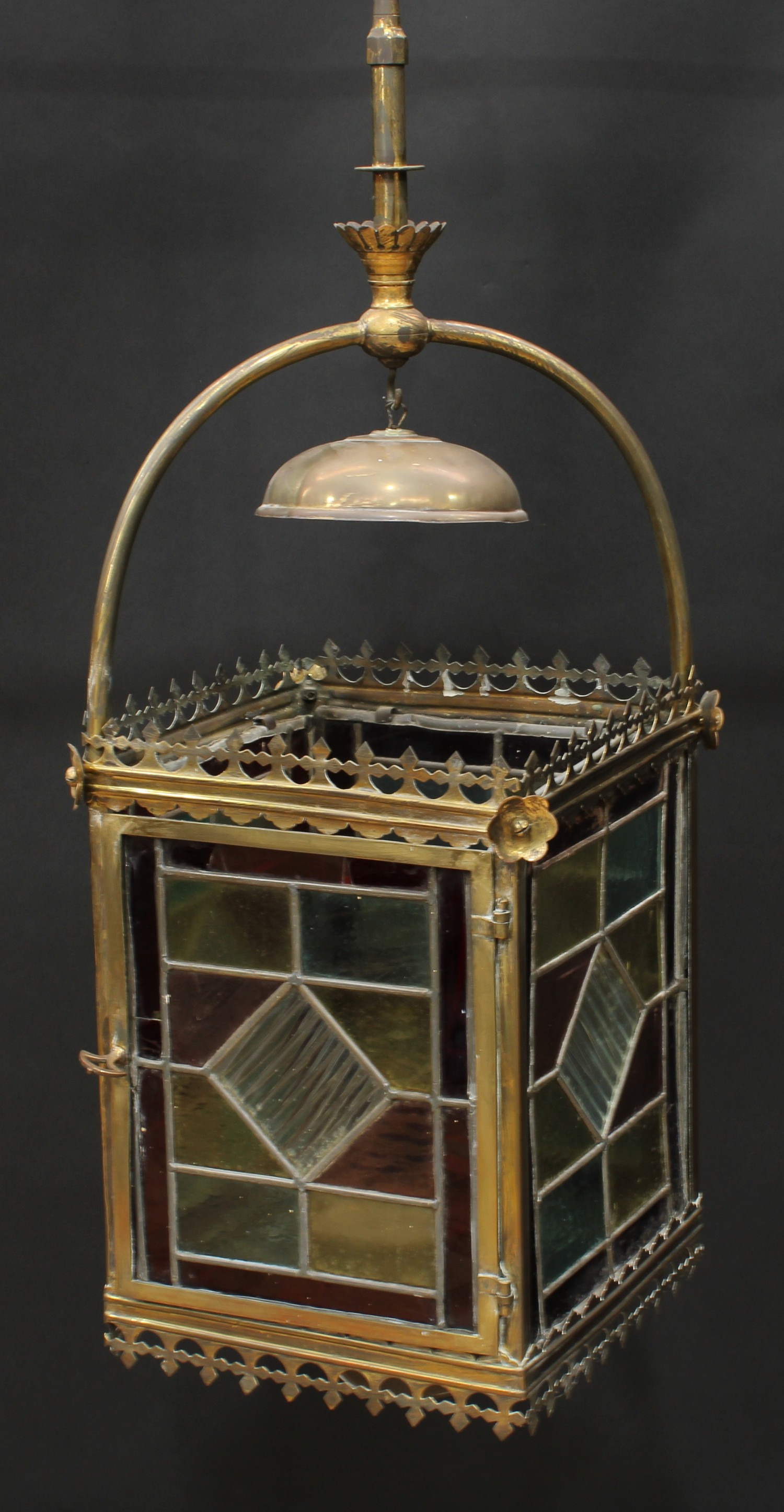 A Reformed Gothic lacquered brass and stained glass ceiling lantern, the leaded glass panels crested - Image 3 of 3