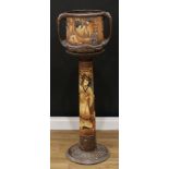 A Bretby Carved Bamboo jardiniere and stand, the jardiniere moulded in low relief with a panoramic