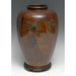 A Chinese ovoid lacquered vase, the splash ground with verdigris patinated characters, 31cm high,
