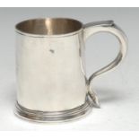 A George I silver spreading cylindrical mug, scroll-capped handle, skirted base, Thomas Tearle,