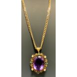 A 19th century amethyst, green stone possibly tourmaline and seed pearl pendant necklace, large