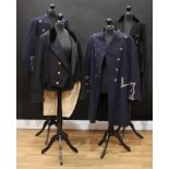 Four Footman's Livery Jackets: one with gilt button with "WM" motif. Black velvet collar. No