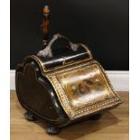 A Victorian Aesthetic Movement japanned toleware cartouche-shaped coal scuttle, the cover