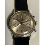 J W Benson - a vintage mid 20th century gentleman's stainless steel cased wristwatch, silvered dial,