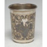 A Russian silver and niello tapered cylindrical beaker, decorated with townscape vignettes and