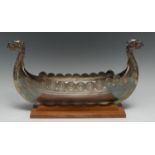 A Norwegian table centre model of a viking long boat, 36cm long, marked H Aase, Norway, fitted