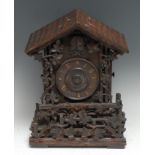 A Black Forest mantel cuckoo clock, 11cm dial applied with Roman numerals, eight-day movement, the