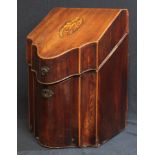 A George III mahogany shaped serpentine front knife box, hinged sloping cover inlaid with a shell