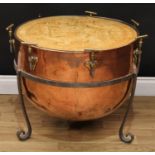 An Arts & Crafts copper timpani kettle, stamped Potter, London, the aperture anachronistically set