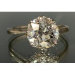 A diamond solitaire ring, round old brilliant cut diamond measuring 7.97mm x 7.84mm x 5.29mm,