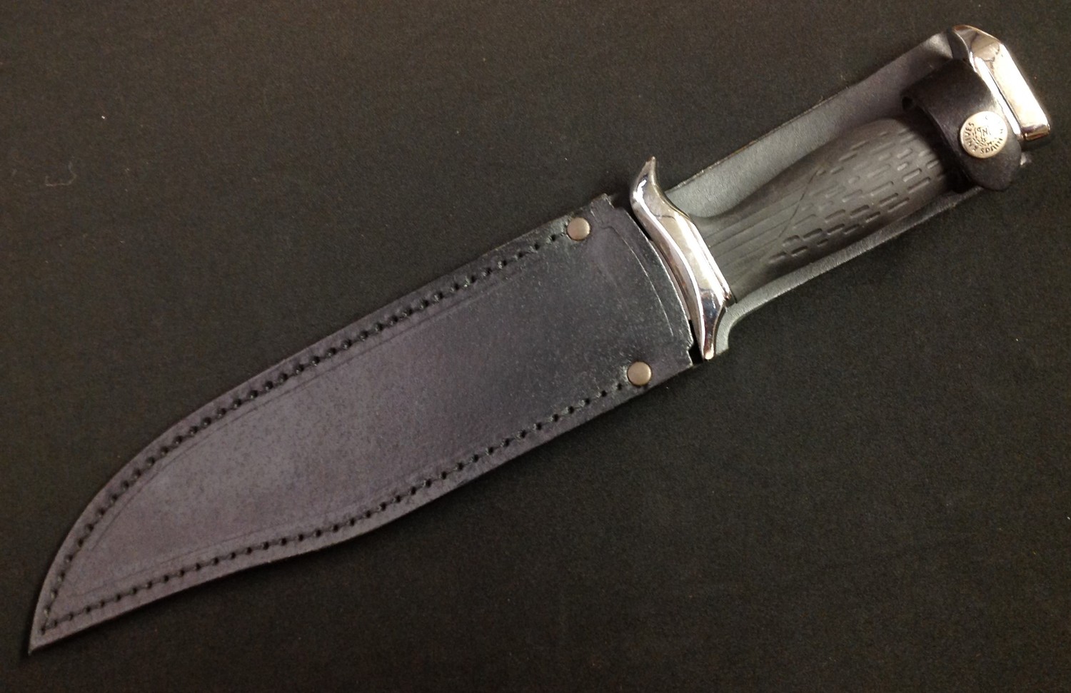 Bowie Knife with 225mm long blade maker marked "Nieto 440c Stainless Handcrafted, Spain". Width of