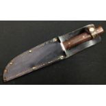 Hunting Knife with Bowie style blade 151mm in length, maker marked "CK" along with "9228" and with
