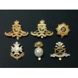 WW2 British cap badge collection comprising of : Royal Artillery cap badges x 2, Royal Army