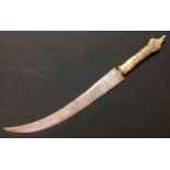 An African dagger, probably Sudanese, 35cm curved blade, Crocodile skin covered grip, 50cm long