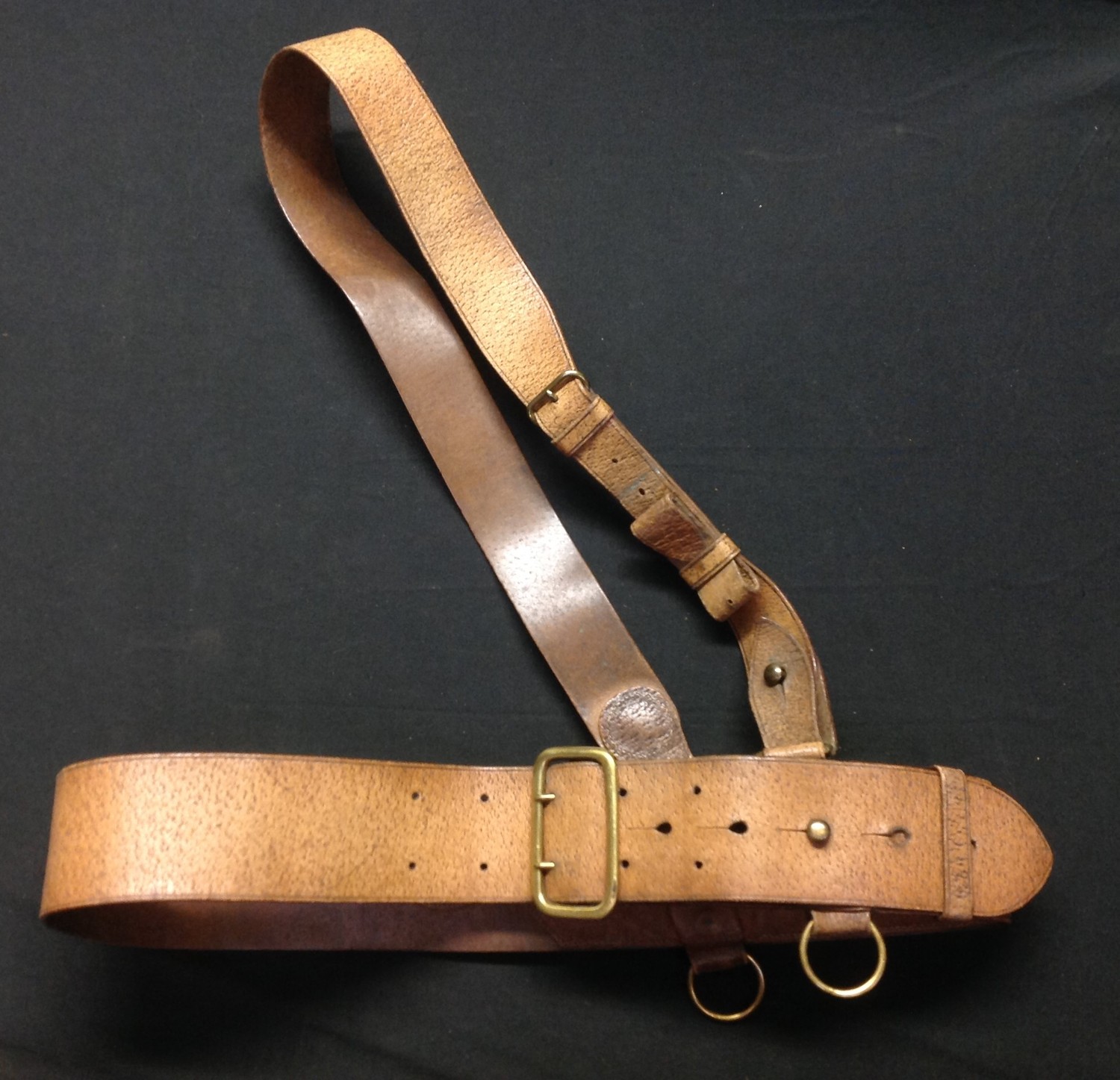 WW2 British Officers Sam Brown leather belt and cross strap. Has a gilt impressed makers mark for "