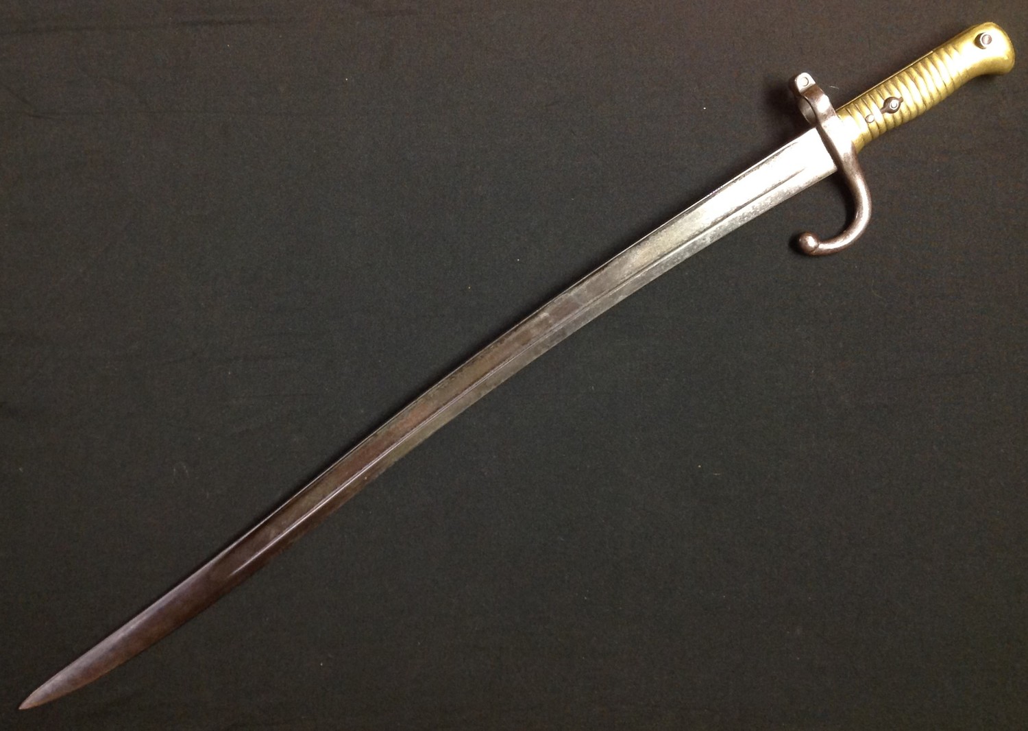 Dutch 1873 Yataghan Bayonet with 572mm long fullered single edged blade, maker marked "P Stevens,