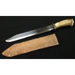 Large Bowie Knife with heavy 338mm long blade. Makers mark is indistinct but shows a Cowboy on