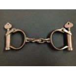 WW2 British Army Military Police issue Handcuffs. Serial numbered "352" Maker marked and dated "