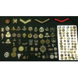 WW2 British cap badges, collar dogs, buttons and shoulder titles including post war examples, mostly