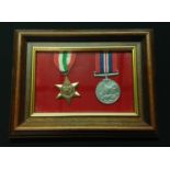 WW2 British Italy Star and War Medal mounted in a frame. Complete with ribbons.