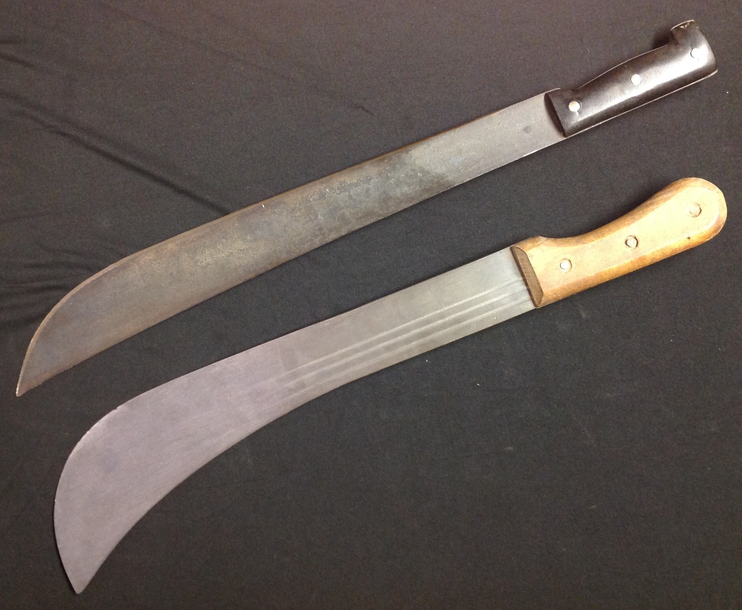 A pair of British Martindale Machetes: one with black composition grip with 460mm long blade, - Image 2 of 7