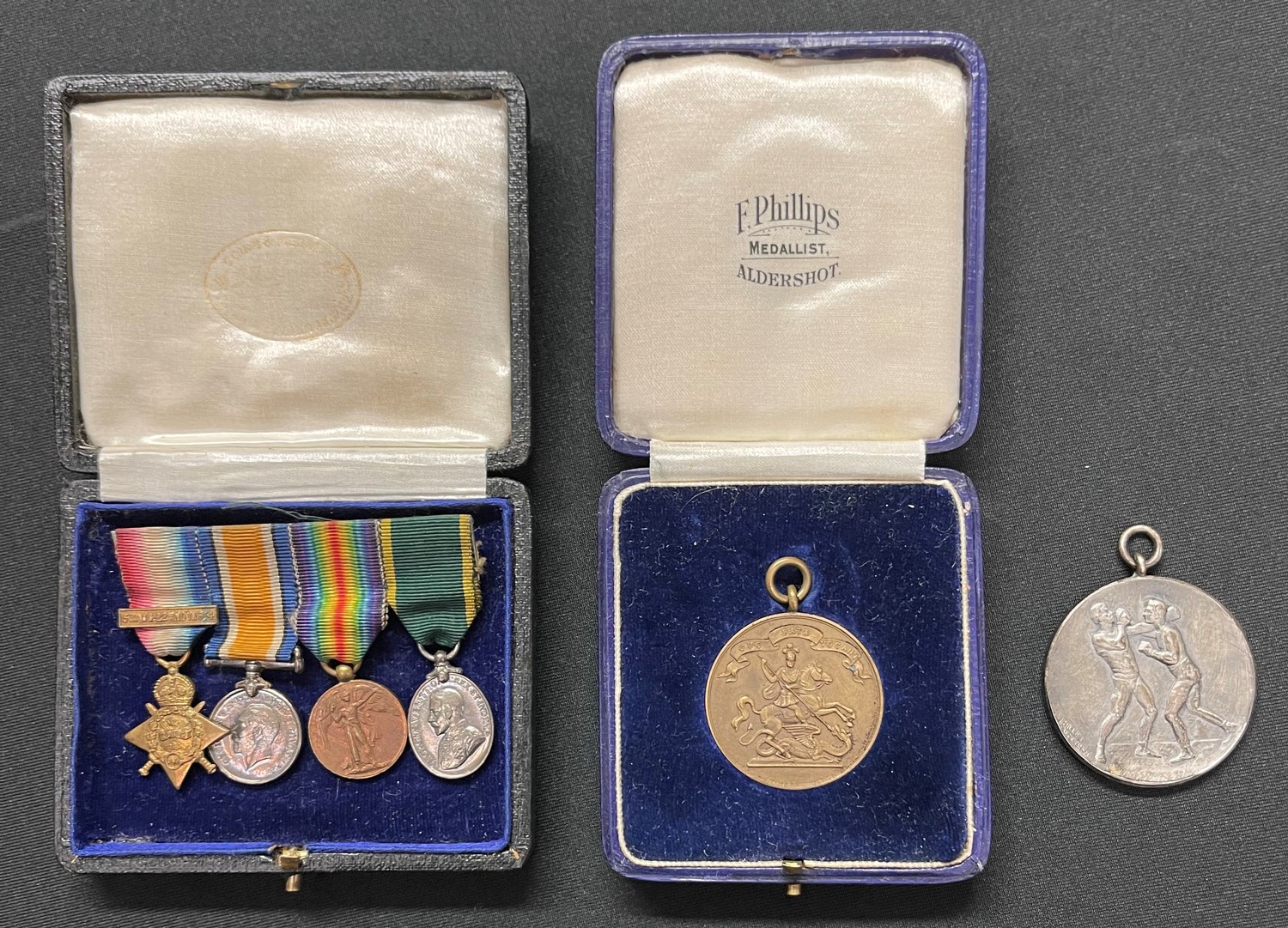 WW1 British miniature medal group comprising of 1914 Star with clasp, War Medal, Victory Medal and