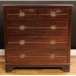 An early 20th century chest, rectangular top with moulded edge above two short and three long