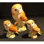 A large Beswick Barn Owl, 1046, 18cm high; another two smaller (3)