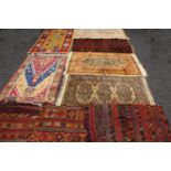 A Persian style Kilim rug; other fragments and carpets (7)