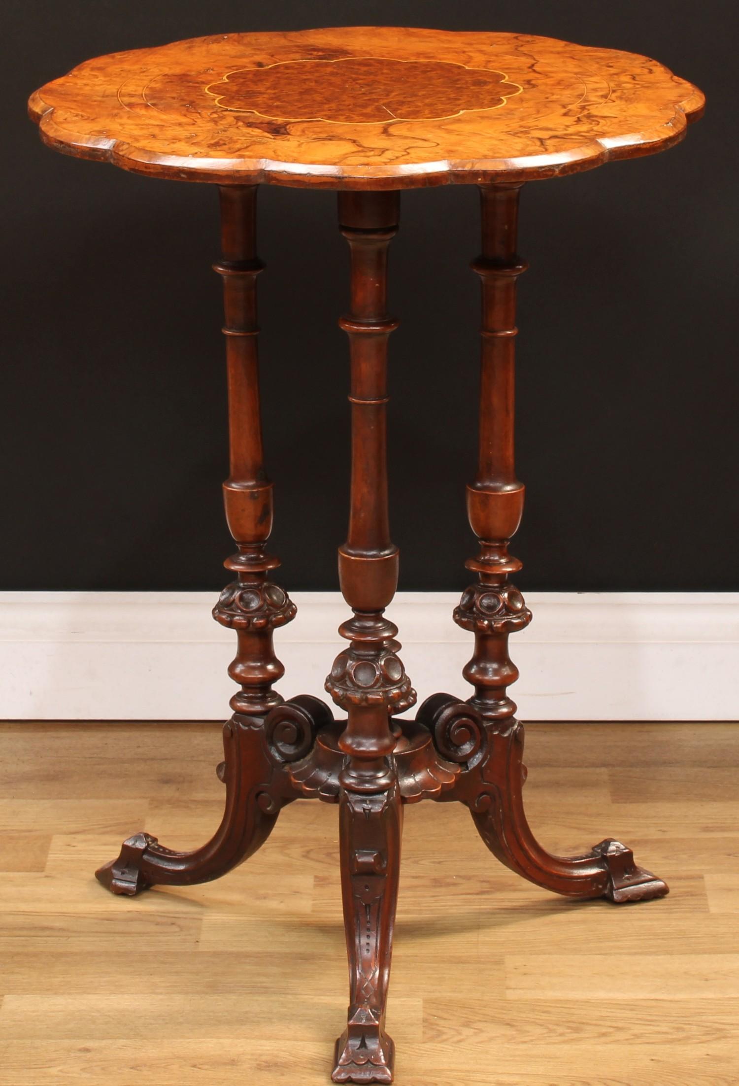 A Victorian walnut and mahogany wine table, rounded dodecagonal top centred by a conforming burr