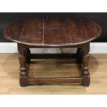A joined oak circular coffee table, in the 18th century taste, 44cm high, 90cm diameter