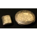 A white metal engraved compact, marked 833; a Victorian plated vesta case (2)