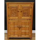 A Rupert Griffiths 'Monastic' oak wine cupboard or drinks cabinet, by John McGinn, slightly