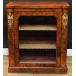 A Victorian gilt metal mounted walnut pier display cabinet or bookcase, hipped rectangular top above