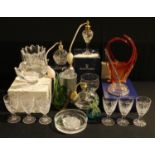 A Waterford Crystal cut glass pen stand and pen, boxed; a Swarovski Crystal swan, 8cm wide, boxed;