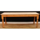 A large pine farmhouse kitchen table, 78cm high, 213cm long, 80cm wide